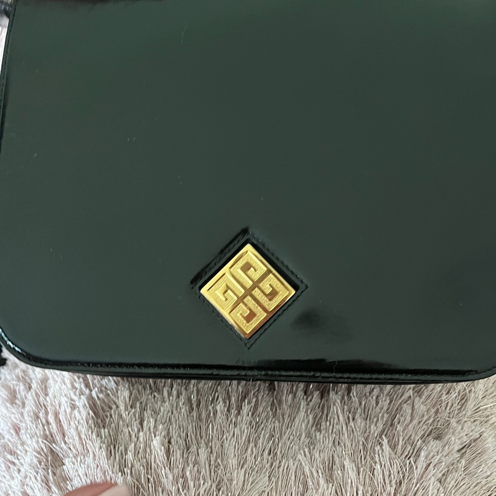 Givenchy vintage black patent leather purse. Gold tone closure.